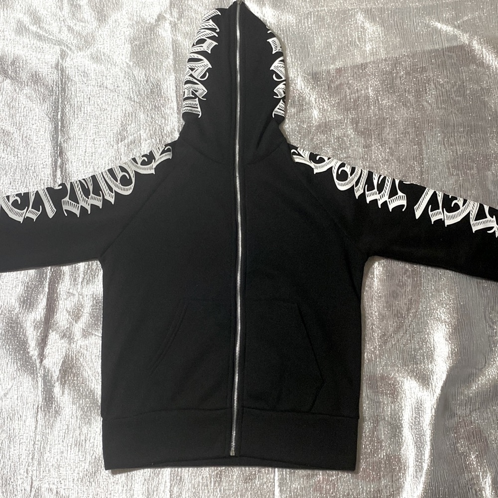 I am offering a full-zip hoodie with gothic typography on the hood and arms.